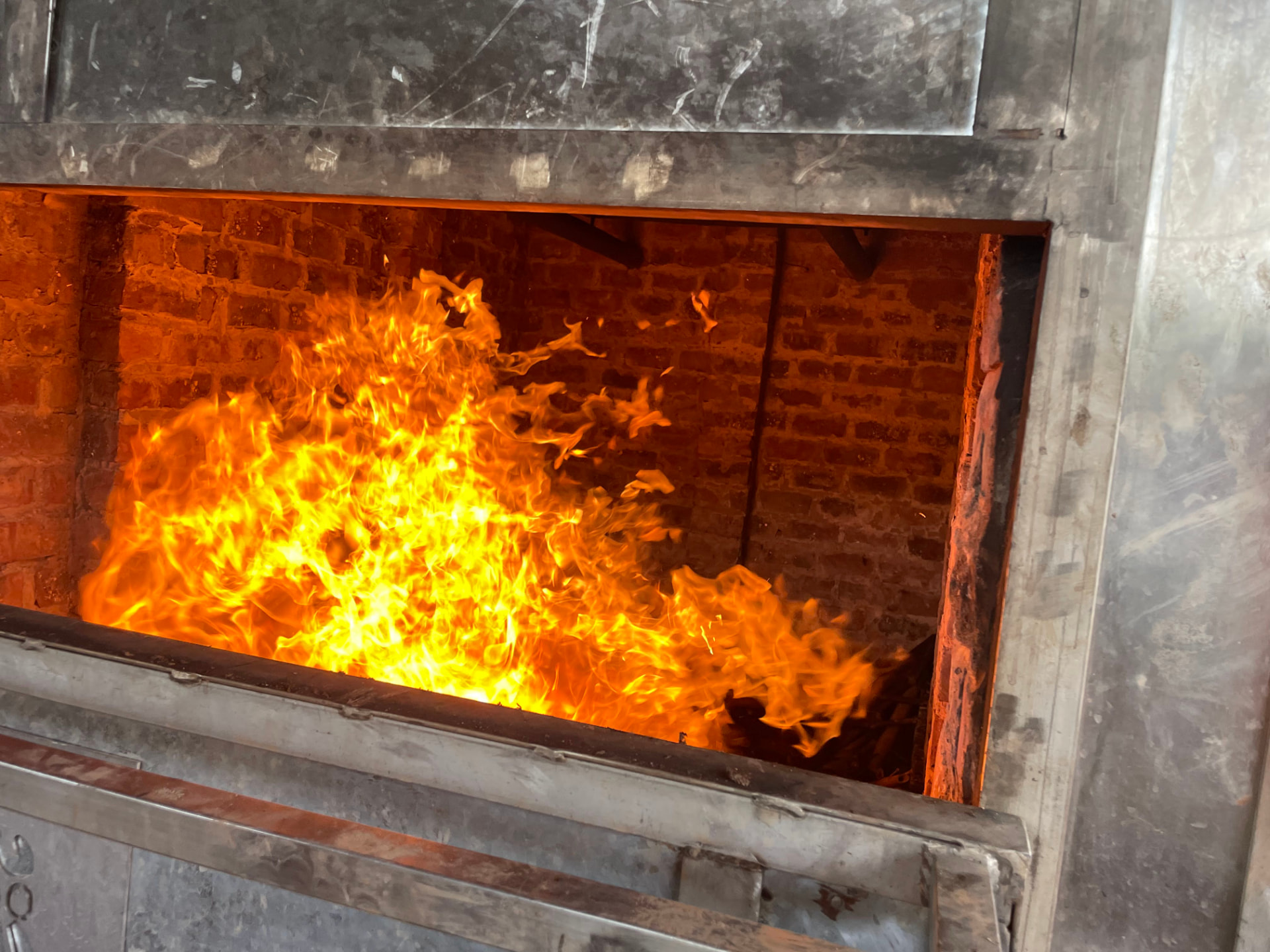 Bamboo burning inside a brick biochar kiln